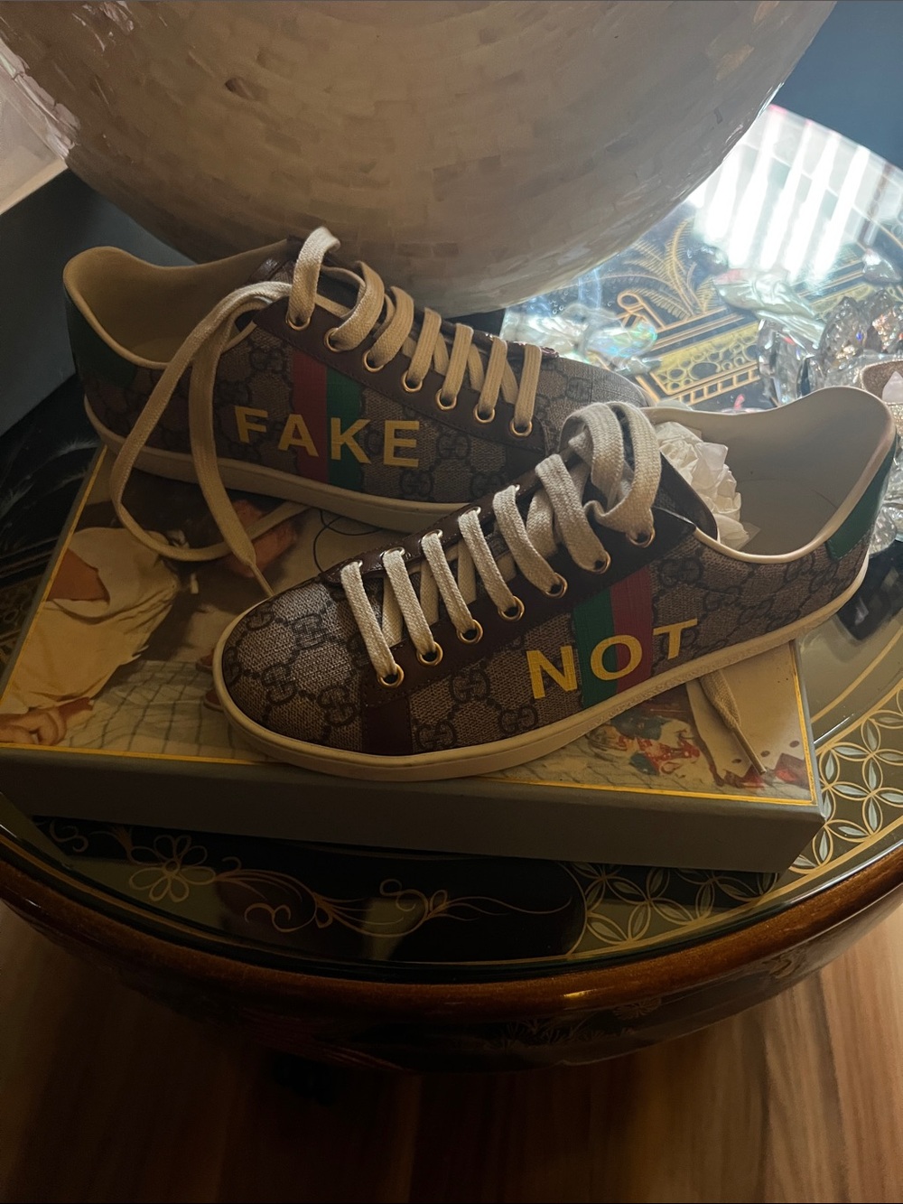 Gucci brown GG Supreme sneakers with green-red web and yellow lettering